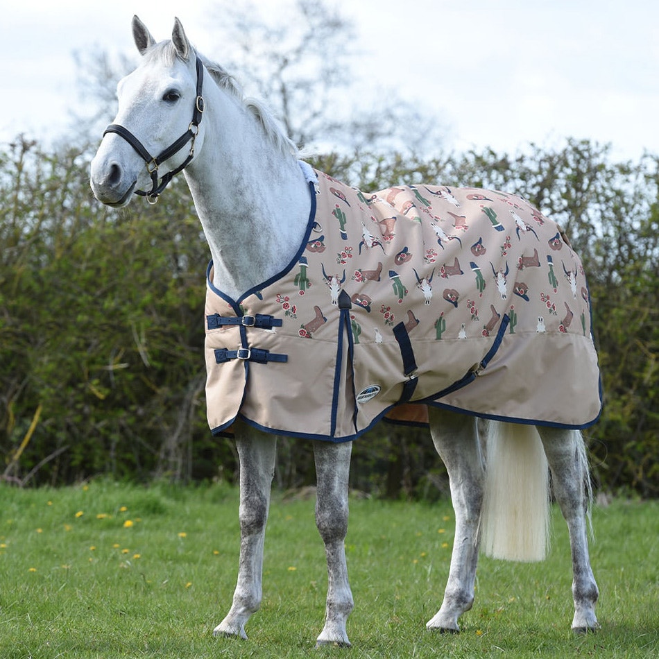 Horse wearing Christmas gingerbread rug