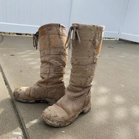 Dublin River Boots covered in mud